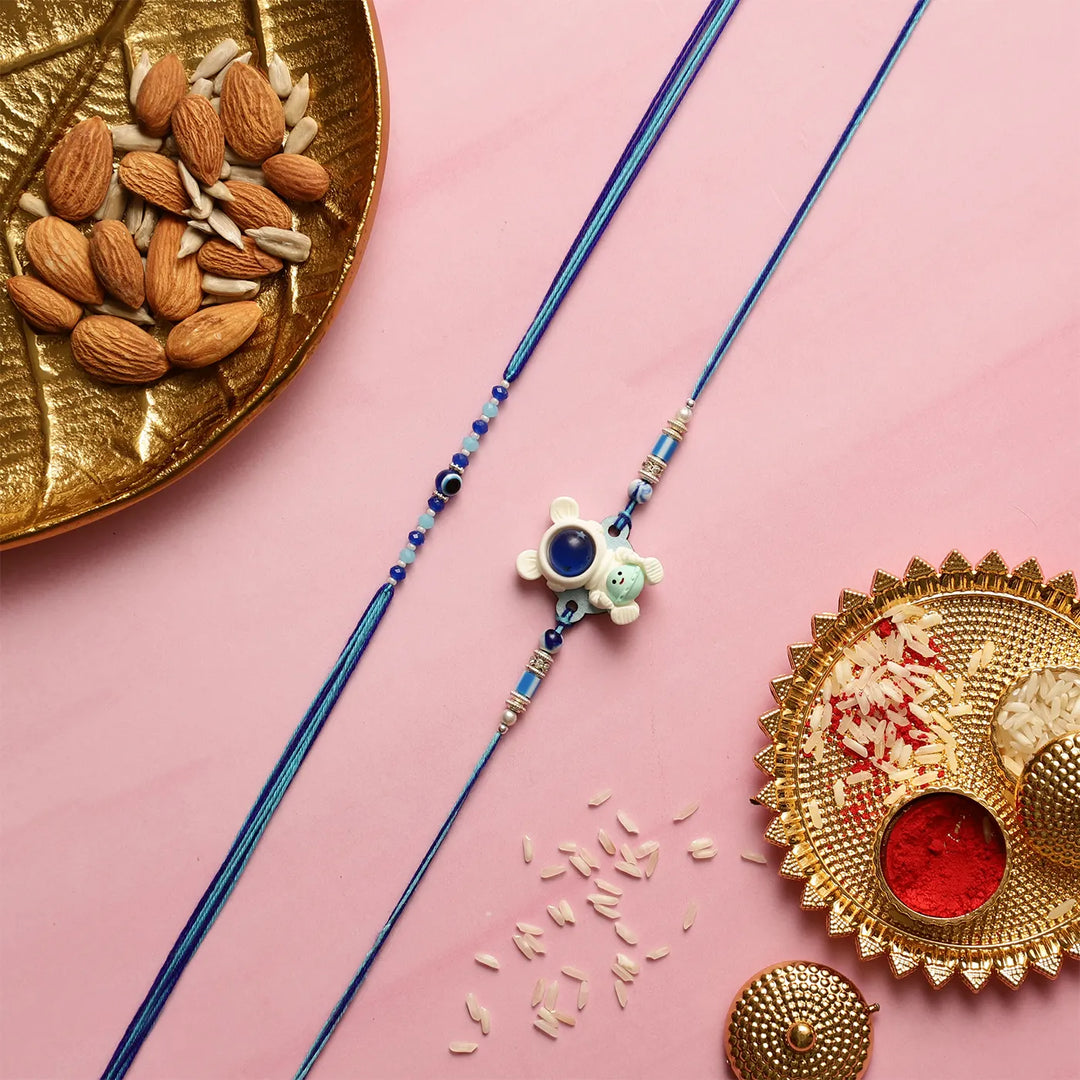 Handmade Astronaut & Evil Eye Kids Rakhi With Roli Chawal | Set Of 2