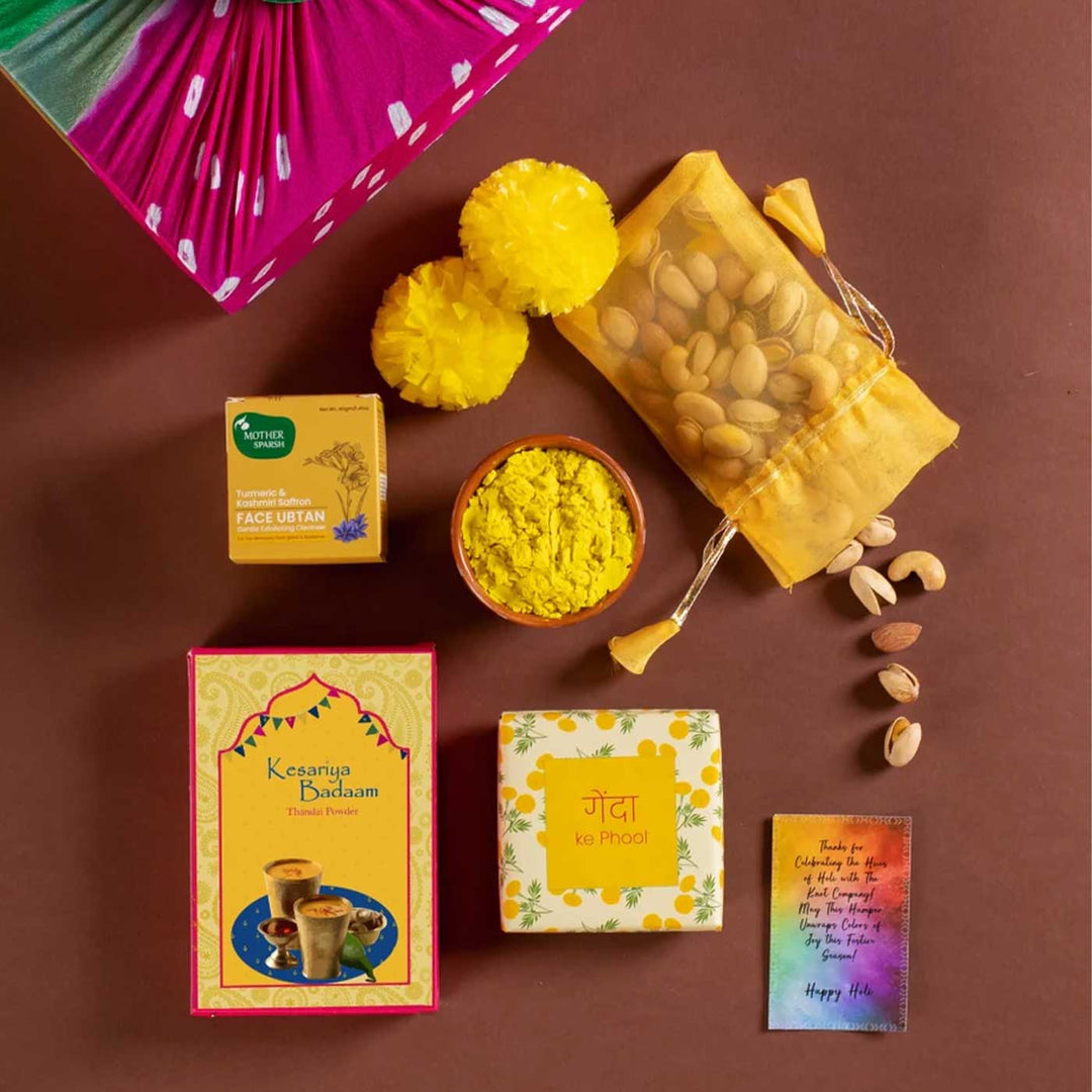 Holi Bliss in Yellow Gift Hamper | Includes 5 Faux Genda Flowers, 1 Yellow Gulaal, 1 Thandai, 1 Mix Dry Fruit Nuts, 1 Uptan Face Mask, 1 Kulhad, 1 Marigold Seeds Pack, 1 Classic Gift Box