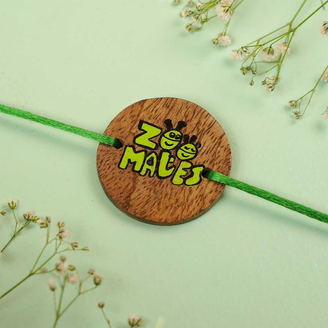 Personalized Hand Painted Zoomates Wooden Rakhi With Roli Chawal - Close-up View