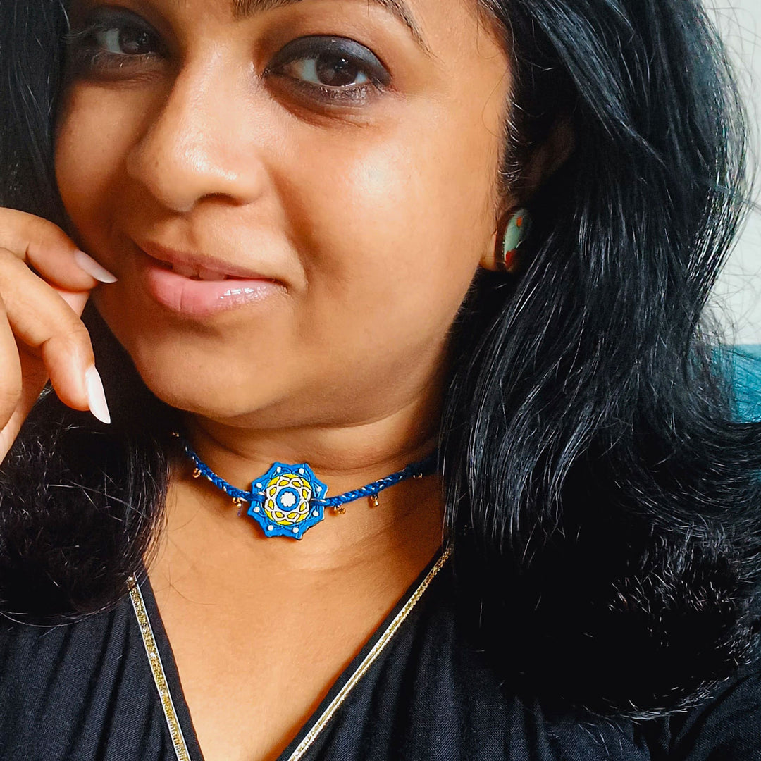 Handmade Blue Jaipuri Ghungroo And Shell Beads Wooden Lumba Rakhi For Bhabhi With Roli Chawal - Worn Necklace on Model