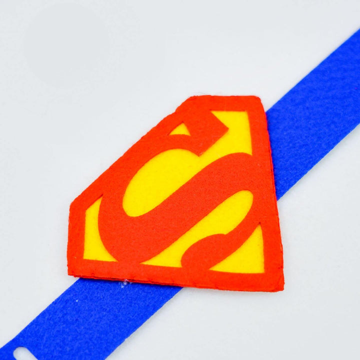 Kids Theme Felt Rakhi Band With Roli Chawal 1 - Close-up of Superhero Emblem