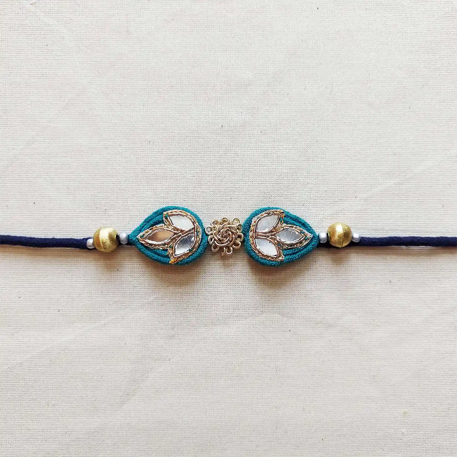 Handmade Beaded Mirror Work Elegant Rakhi With Roli Chawal - Close-up Front View