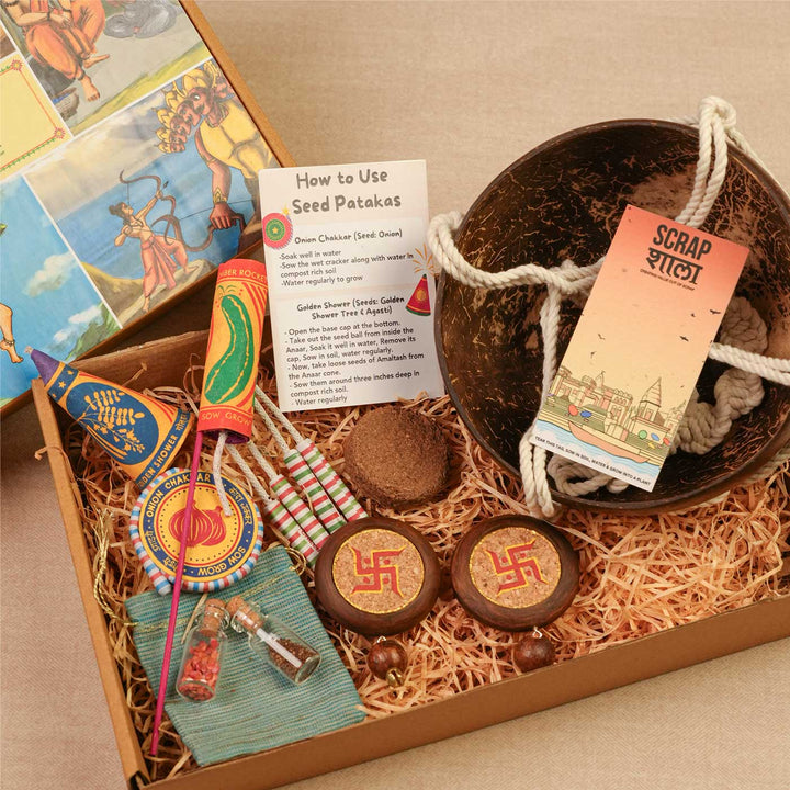 Handmade Prakriti Gift Hamper | Includes Coconut Shell Hanging Planter, Seed Jars, Seed Crackes, Cocopeat, Swastik Door Hanging, Cracker Instruction Card, Seed Card And Outer Box