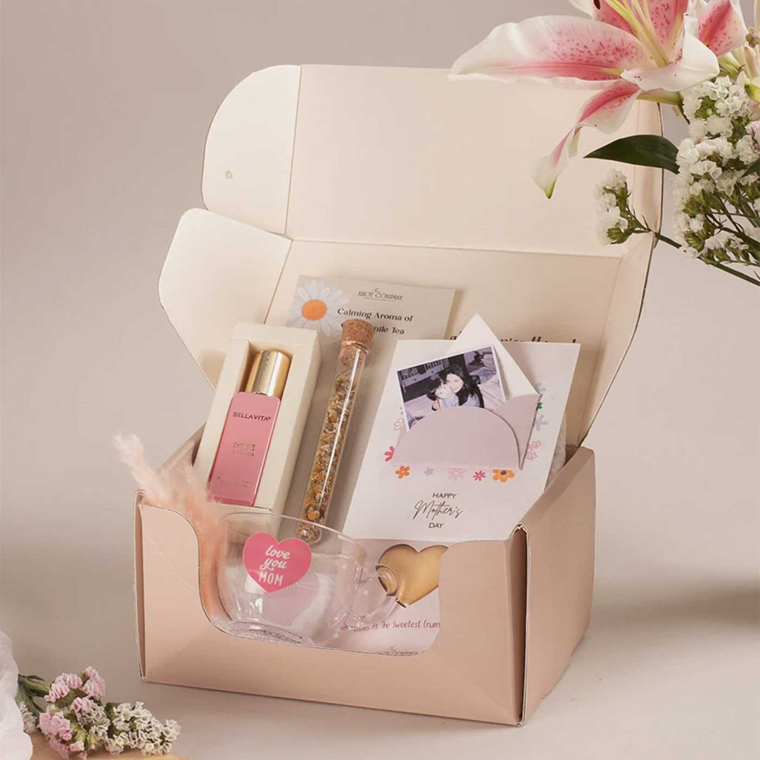 Photo Personalized Celebrating Mom’s Love Gift Hamper | Includes 1 Perfume, 4 Heart-Shaped Baked Cookies, 1 “Love You Mom” Glass Tea Cup, 1 Mother’s Day Card, 1 Chamomile Tea Glass Tube, 1 All Things Nice Gift Box