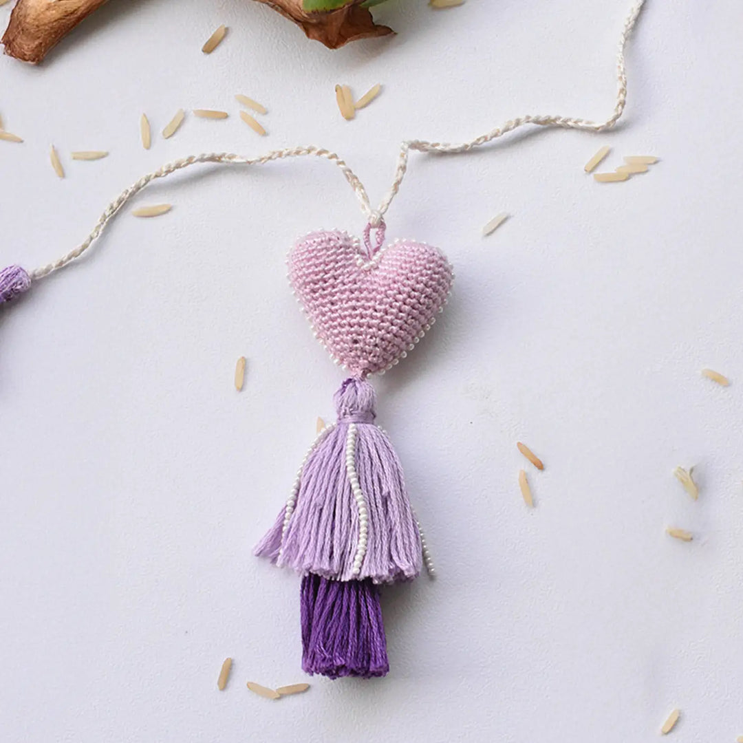 Handmade Crochet Purple Heart & Tassels Lumba Rakhi For Bhabhi With Roli Chawal