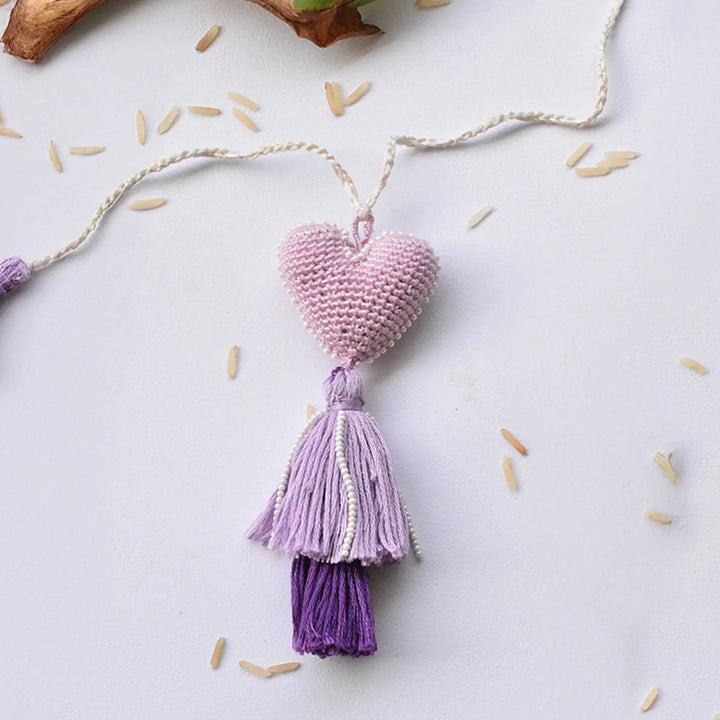 Handmade Crochet Purple Heart & Tassels Lumba Rakhi For Bhabhi With Roli Chawal