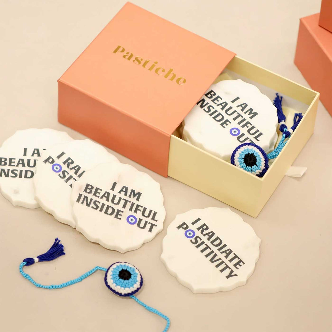 Handmade Crochet Evil Eye Design Cotton Rakhi Hamper Includes 1 Rakhi And 4 Coaster - In Packaging with Coasters and Bracelet
