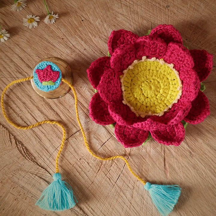 Handmade Crochet Lotus Rakhi And Tealight Holder Combo With Roli Chawal Set Of 2 - Flat Lay Display of Flower and String
