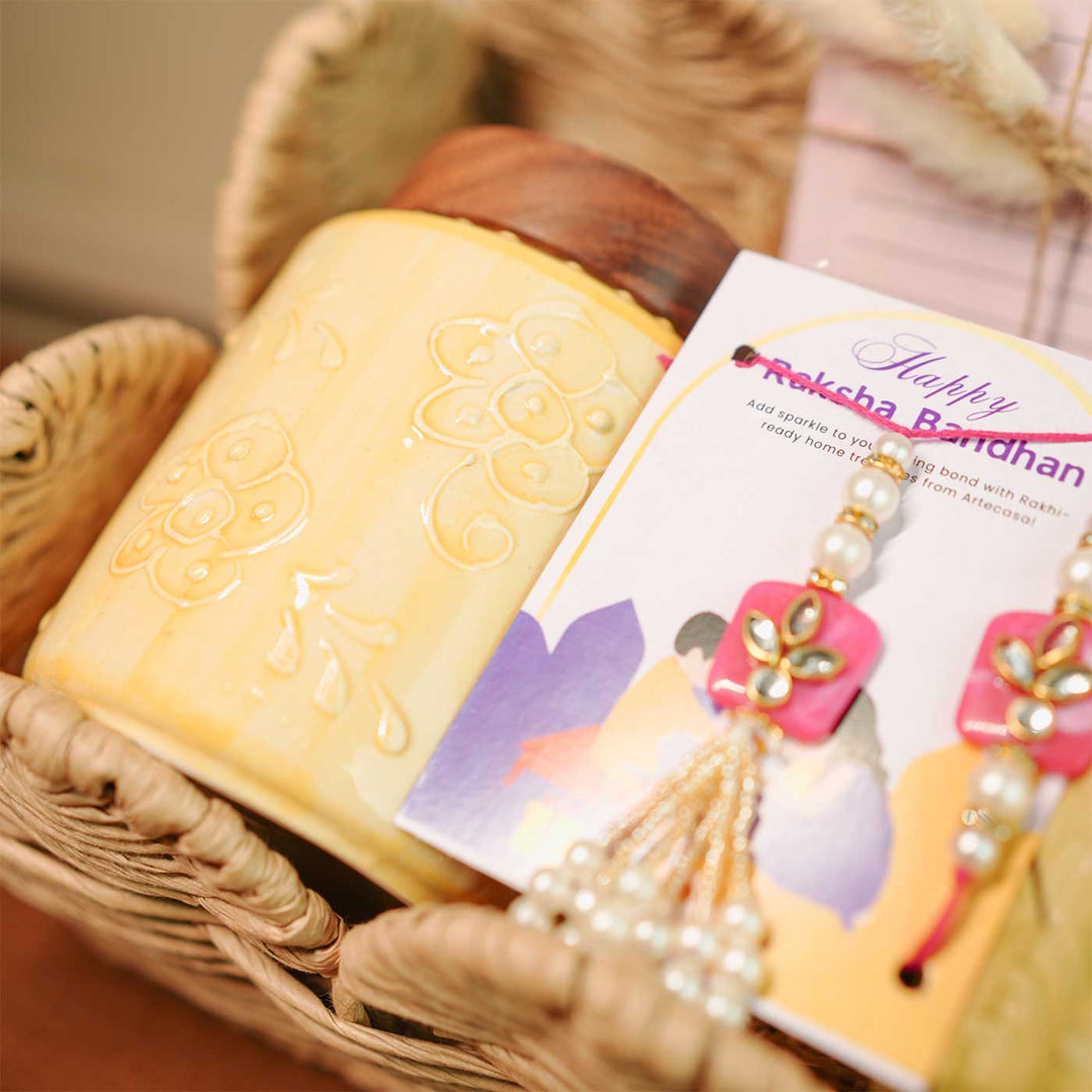 Personalized Handmade Rakhi Hamper Includes 1 Basket 2 Jars 2 Rakhis 1 Roli Chawal And 1 Message Card - Close-up on Yellow Jar and Rakhi