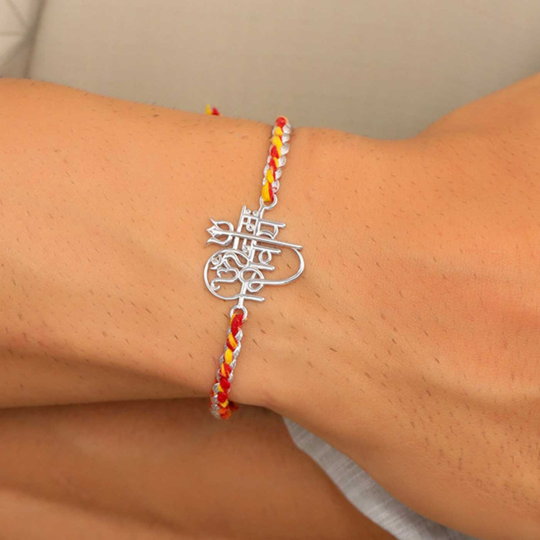 Handmade Om Namah Shivaya Silver Rakhi For Brother - On Wrist Display