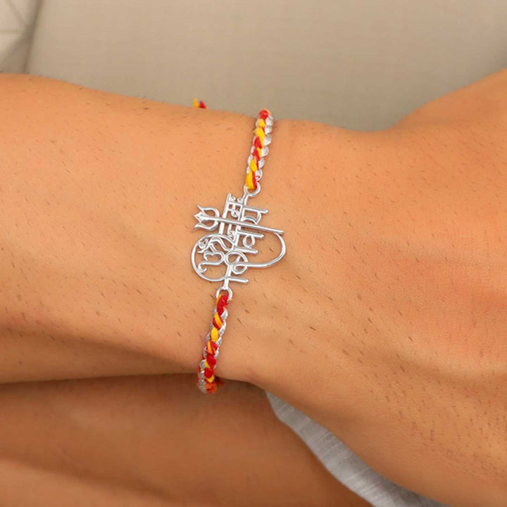 Handmade Om Namah Shivaya Silver Rakhi For Brother - On Wrist Display