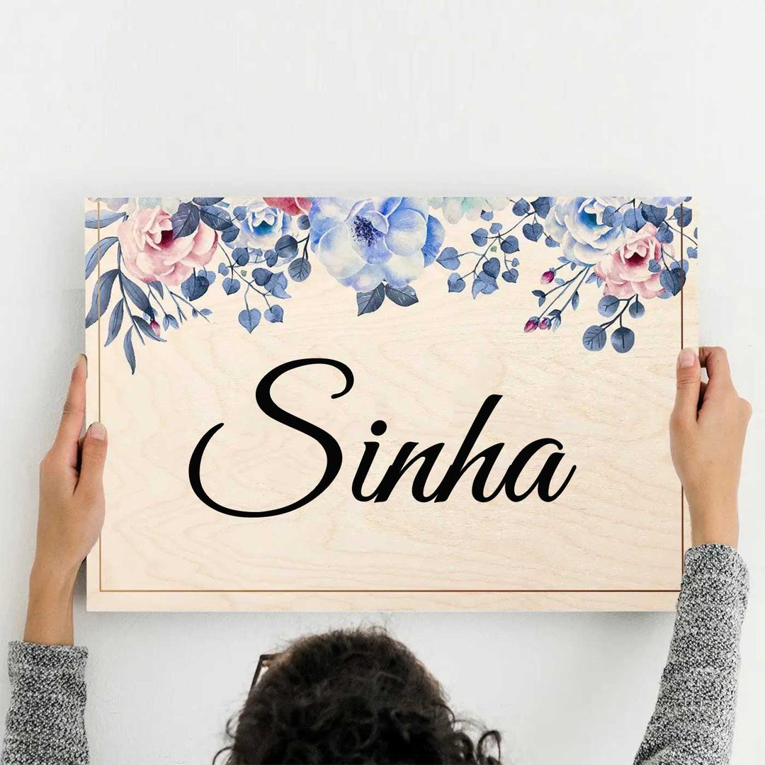 Printed Blue Spring Floral Wooden Rectangle Nameplate - Front View Held Above Head