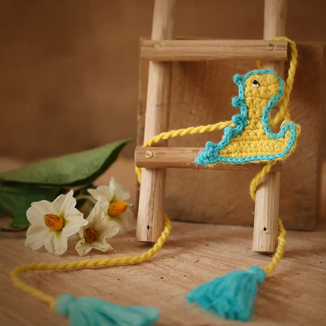 Handmade Crochet Baby Dragon Theme Kids Rakhi And Toy Combo With Roli Chawal Set Of 2 - Ladder Accessory Close-up with Tassels
