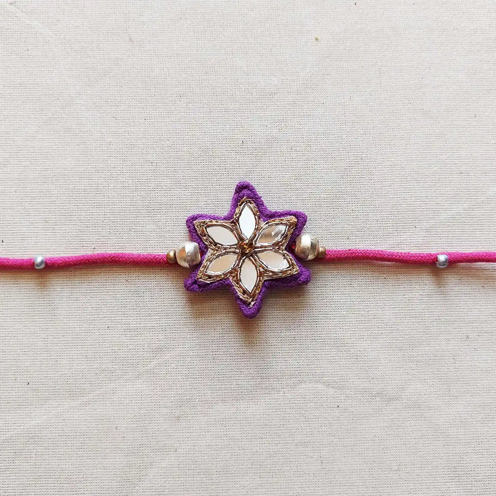 Handmade Mirror Work Flower Rakhi With Roli Chawal - Close-up Front View (10)
