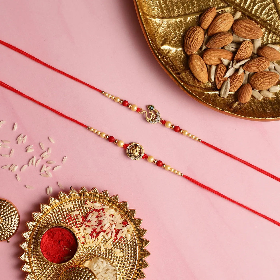 Handmade Ganesha & Om Rakhi With Roli Chawal | Set Of 2