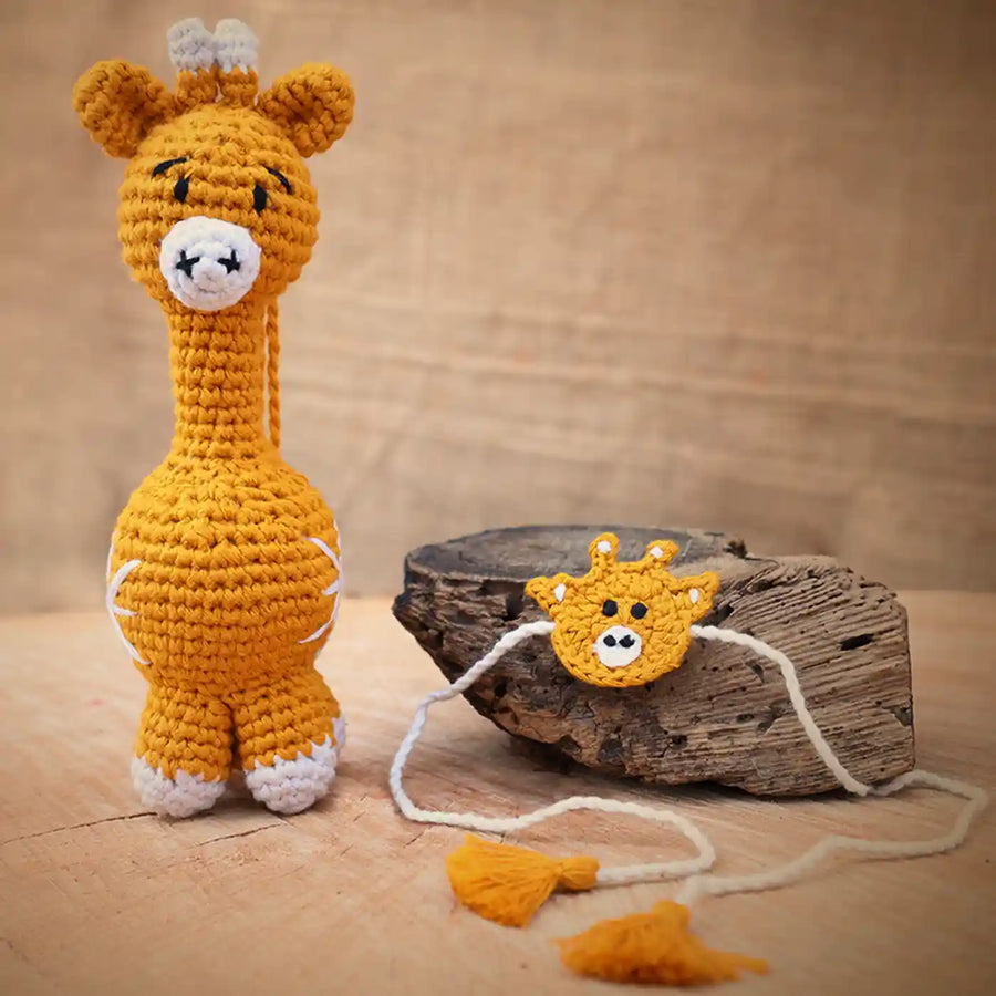 Handmade Crochet Giraffe Theme Kids Rakhi And Toy Combo With Roli Chawal Set Of 2 - Product and accessory display