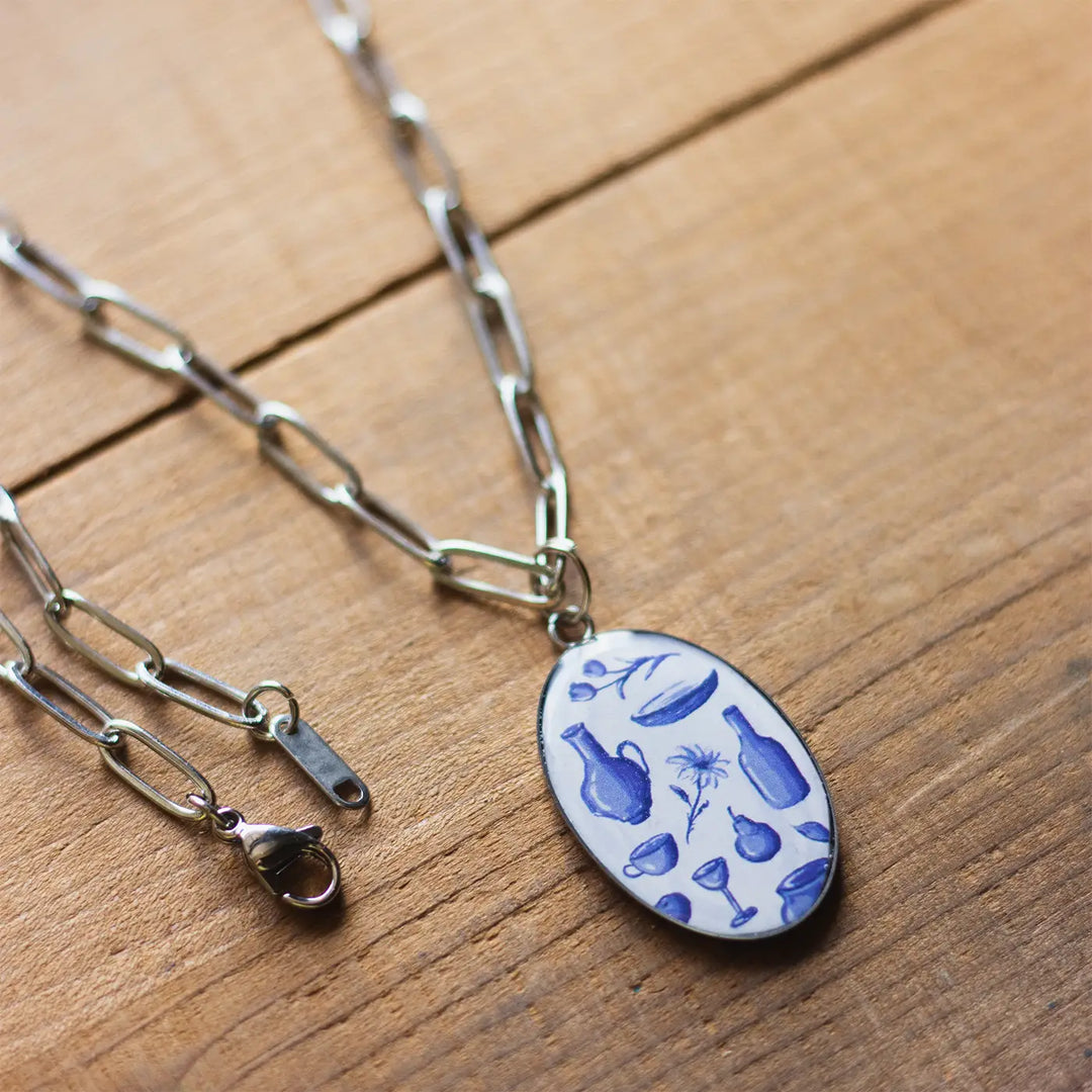 Illustrated White Ceramic Objects Inspired Resin & Stainless Steel Necklace