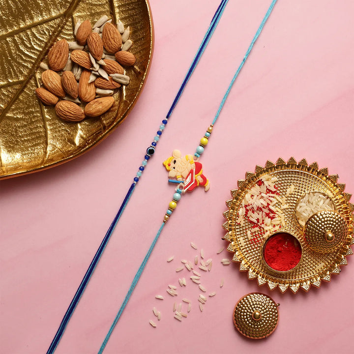 Handmade Ganesha & Evil Eye Kids Rakhi With Roli Chawal | Set Of 2