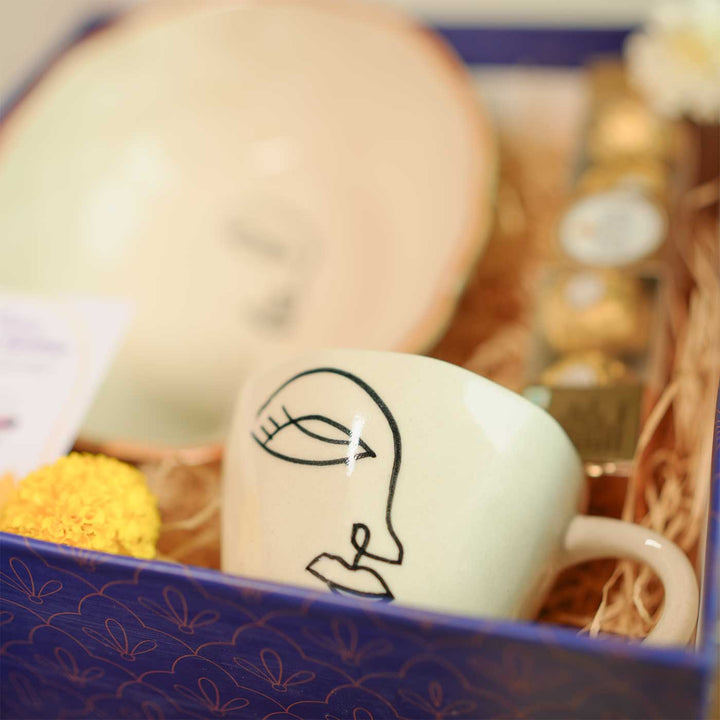 Personalized Handmade Food Lover Bhabhi Rakhi Hamper Includes 1 Gift Box 1 Mug 1 Bowl 1 Rakhis 1 Roli Chawal 1 Chocolate And 1 Message Card - Abstract Face Mug Close-up