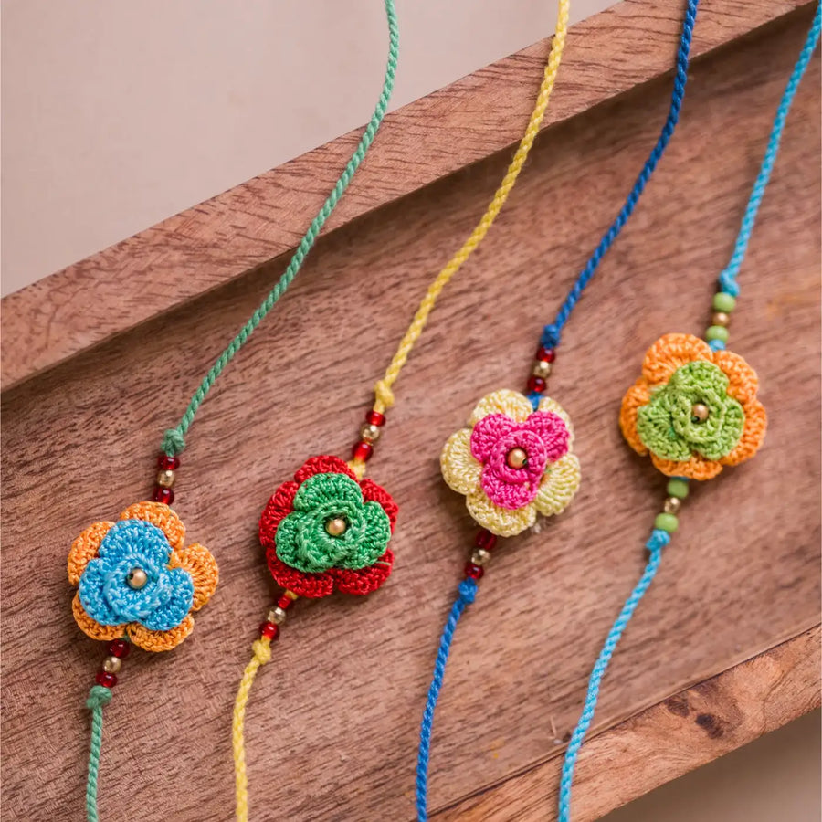 Handmade Crochet Multicolor Roses Rakhi With Roli Chawal Set Of 4 - Close-up of Flower Charms