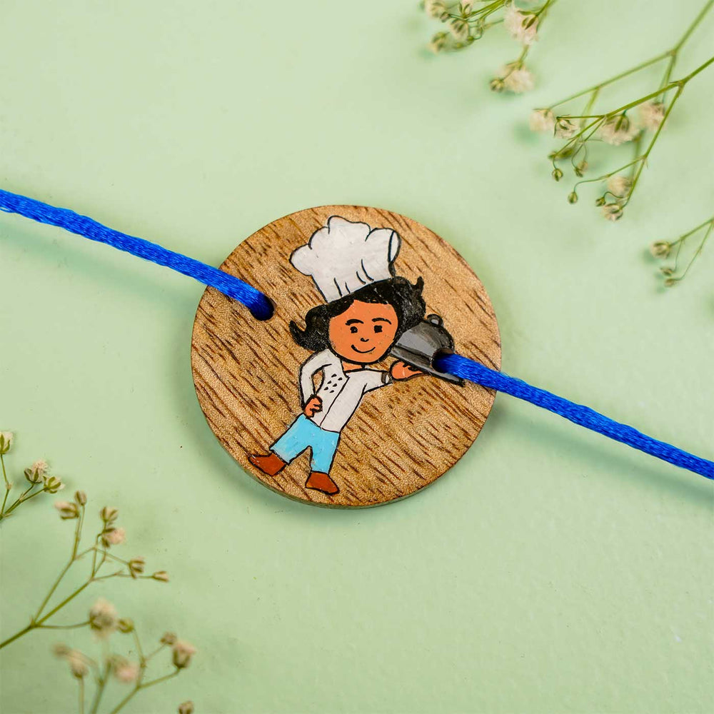 Personalized Hand Painted Chef Theme Wooden Rakhi With Roli Chawal - Close-up of Wooden Medallion