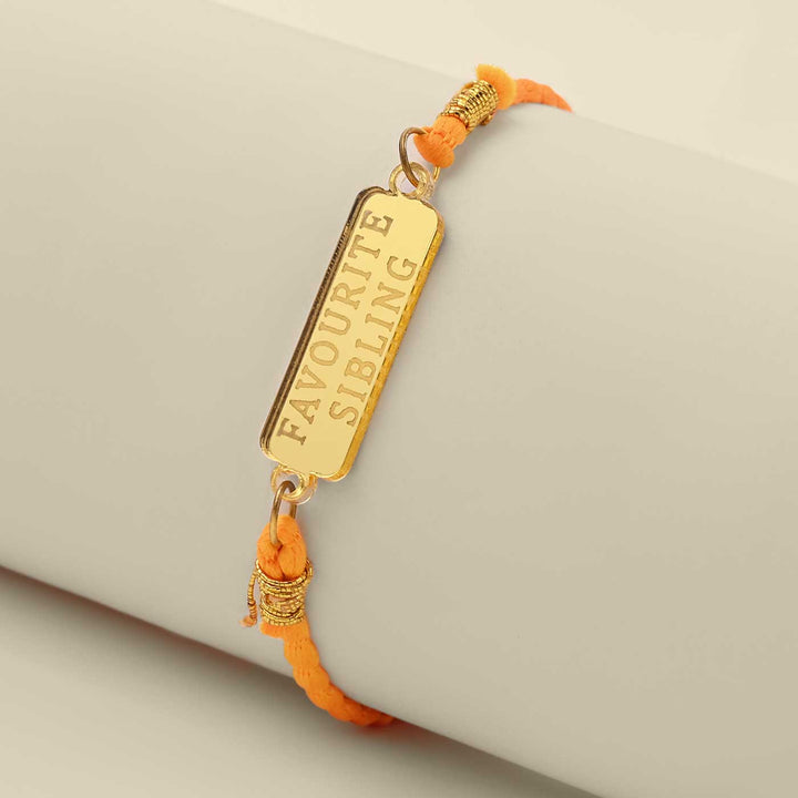 Handmade Favoirite Sibling Design Acrylic Rakhi - Angled View on Display Stand