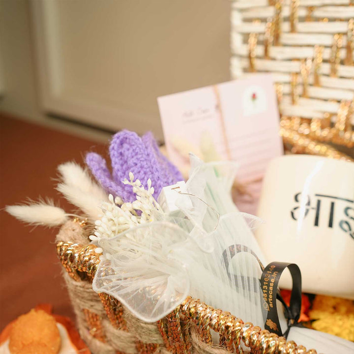 Personalized Handmade Crochet Evil Eye Theme Rakhi Hamper Includes 1 Basket 1 Mug 1 Candle 1 Crochet Flower 2 Rakhis 1 Roli Chawal And 1 Message Card - Crochet Tulip Flower Arrangement Detail