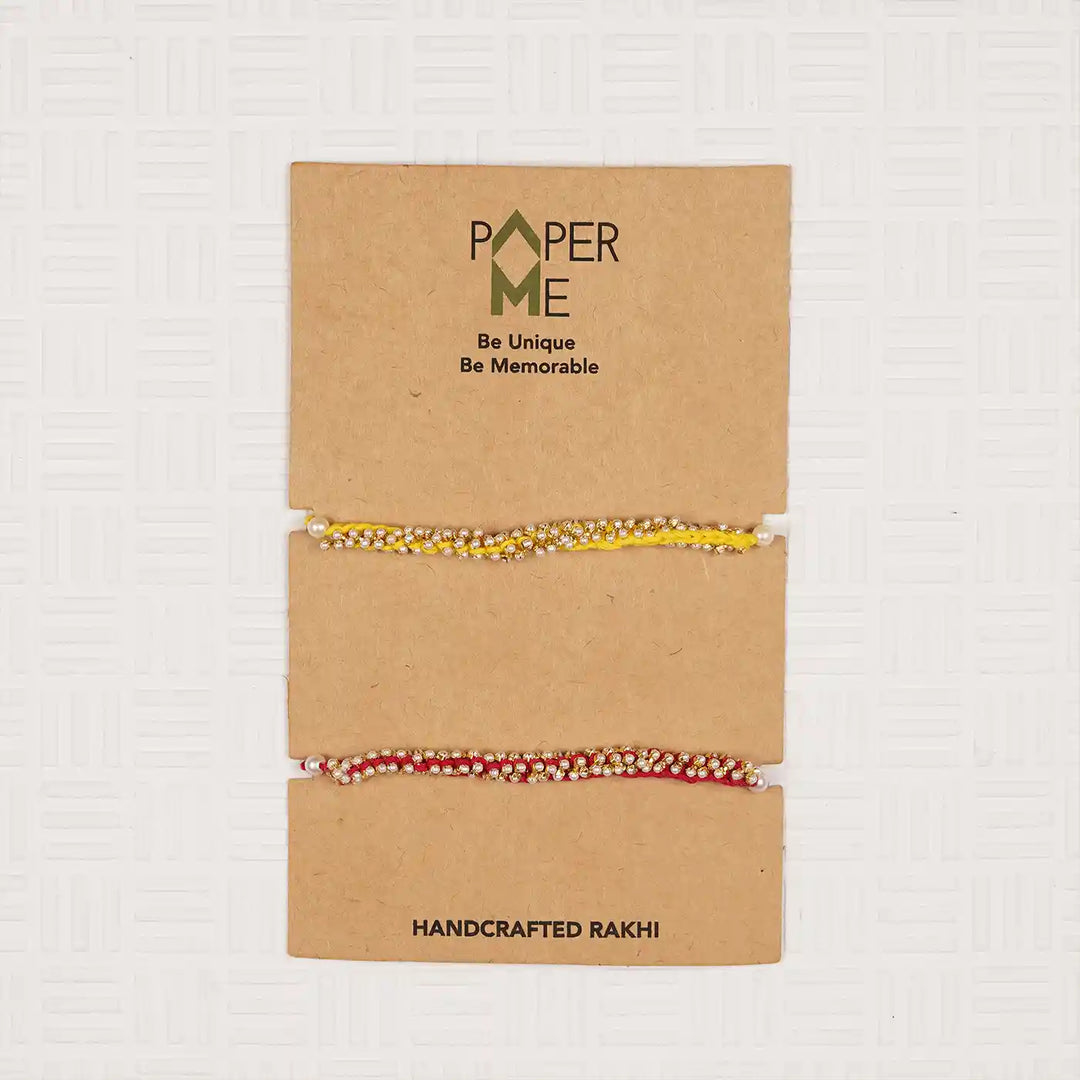 Handmade Crochet Pearl Rakhi With Roli Chawal Set Of 2 - Packaged on Display Card
