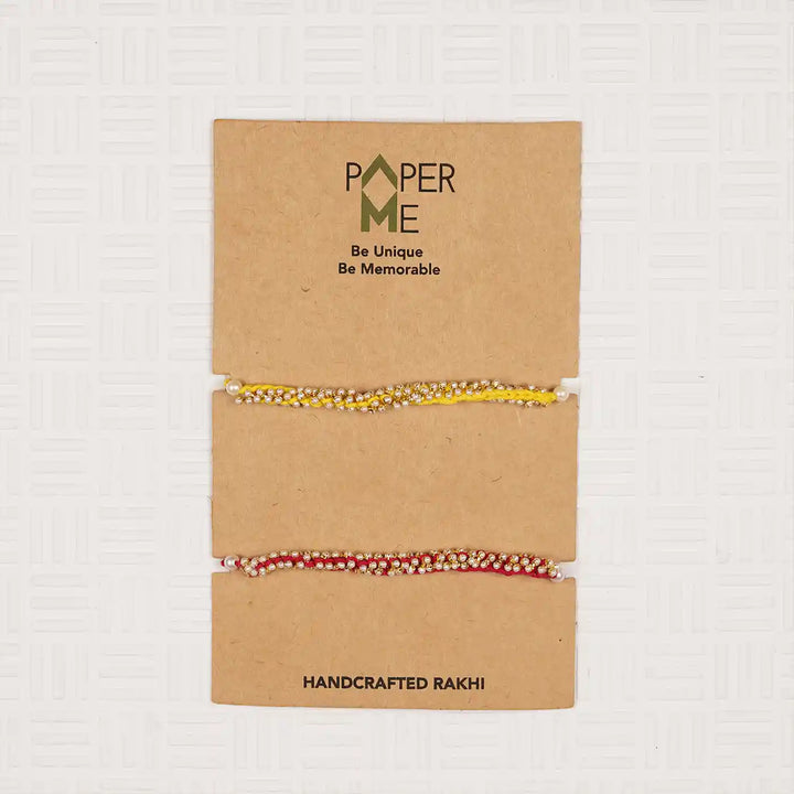 Handmade Crochet Pearl Rakhi With Roli Chawal Set Of 2 - Packaged on Display Card