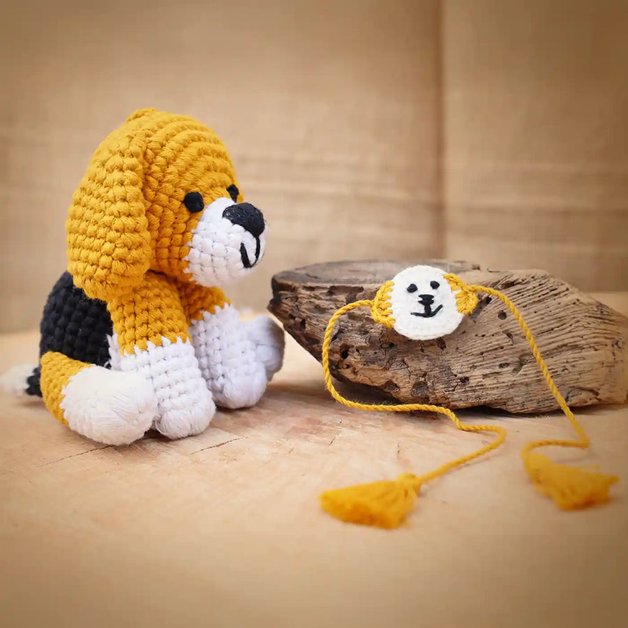 Handmade Crochet Dog Theme Kids Rakhi And Toy Combo With Roli Chawal Set Of 2 - Product and Bracelet Display