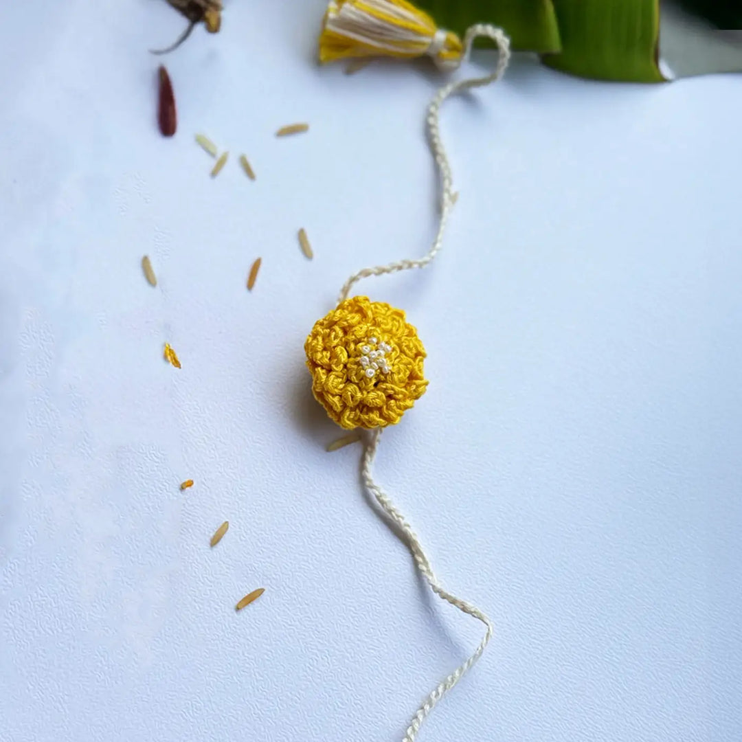Handmade Crochet Marigold Bhaiya Bhabhi Rakhi With Roli Chawal | Set Of 2