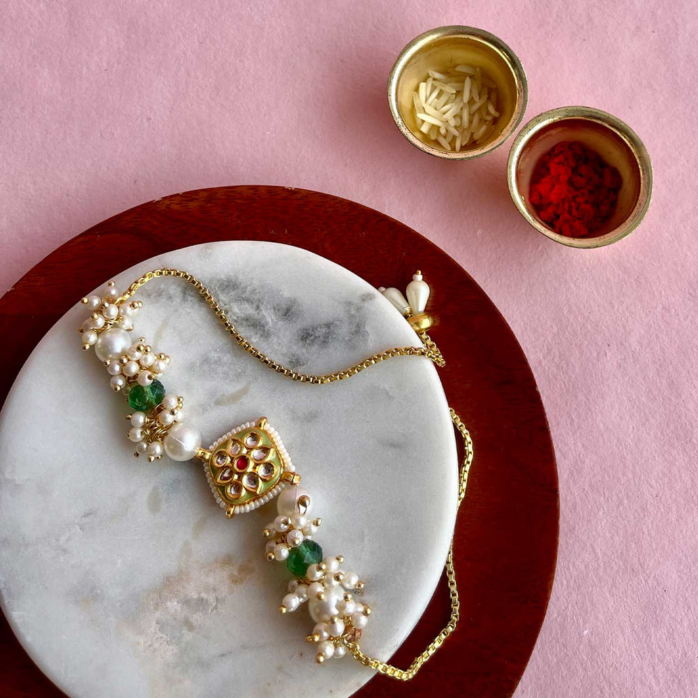 Handmade Golden Flower Design Metal Bhaiya Bhabhi Rakhi - Single Piece Display