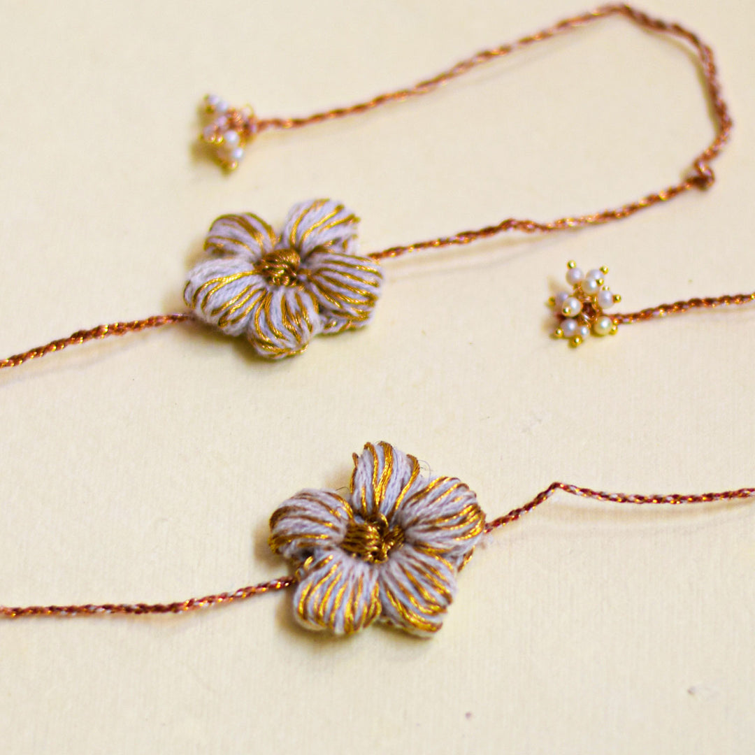 Handmade Crochet Flower And Ghungroo Design Bhaiya Bhabhi Rakhi With Roli Chawal - Floral bracelets with decorative ends