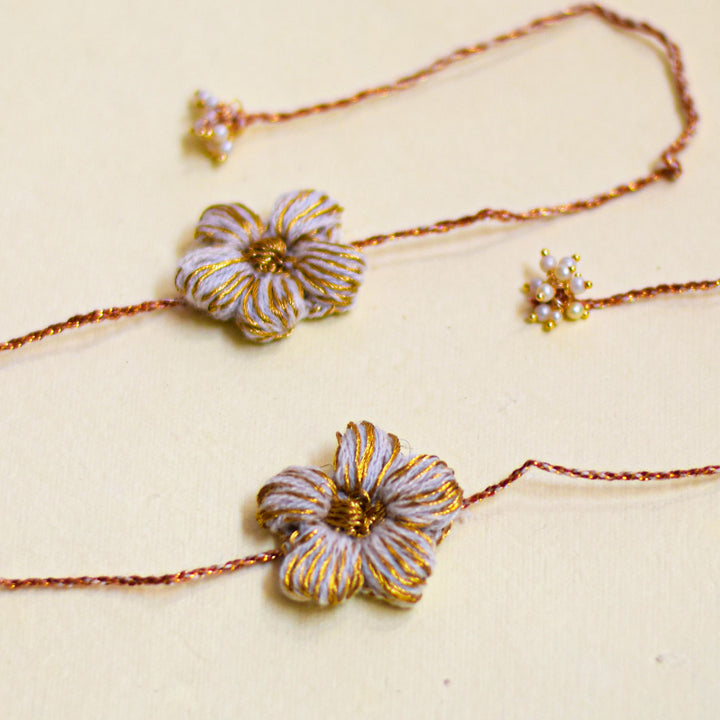 Handmade Crochet Flower And Ghungroo Design Bhaiya Bhabhi Rakhi With Roli Chawal - Floral bracelets with decorative ends