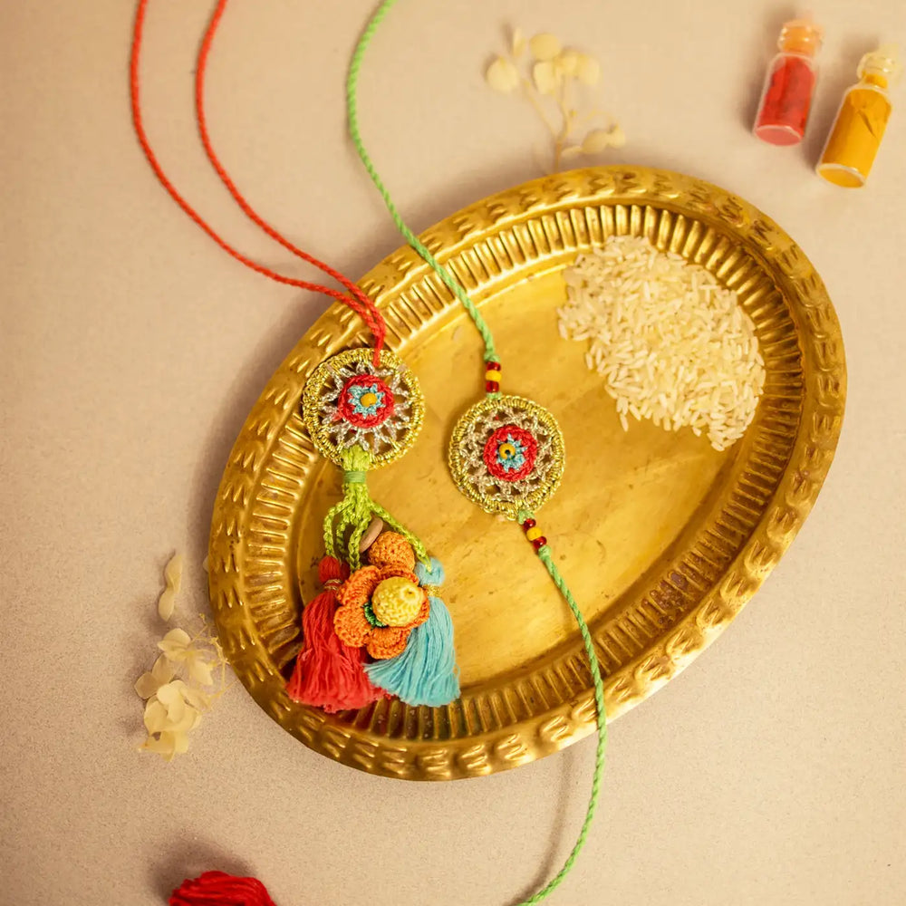 Handmade Crochet Gold Dreamcatcher Bhaiya Bhabhi Rakhi With Roli Chawal Set Of 2 - Decorative Presentation on Brass Plate