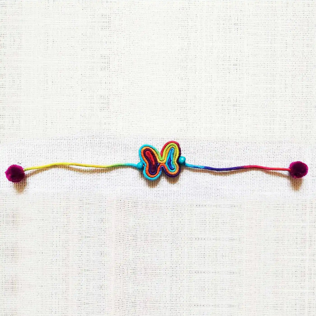 Handmade Dori Work Butterfly Kids Rakhi With Roli Chawal - Flat Lay Full Length