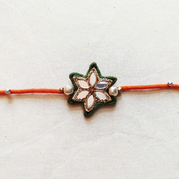 Handmade Mirror Work Flower Rakhi With Roli Chawal - Close-up Front View (7)