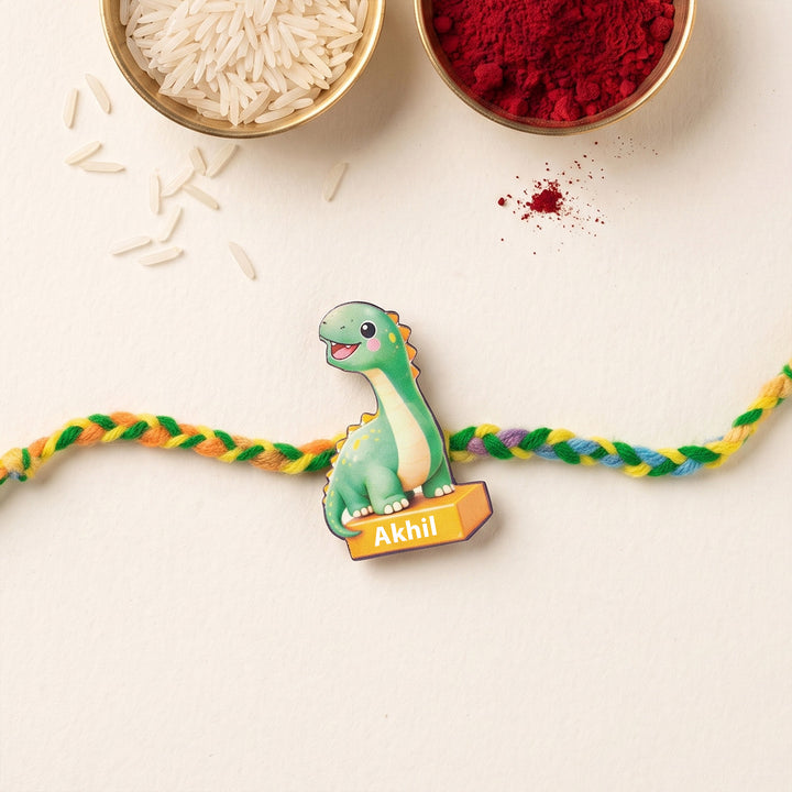 Personalized Reusable Green Dino MDF Wood Rakhi With Roli Chawal