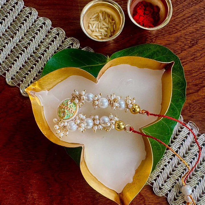Handmade Green Oval Design Pearl And Stone Bhaiya Bhabhi Rakhi - Top View with Accessories Removed