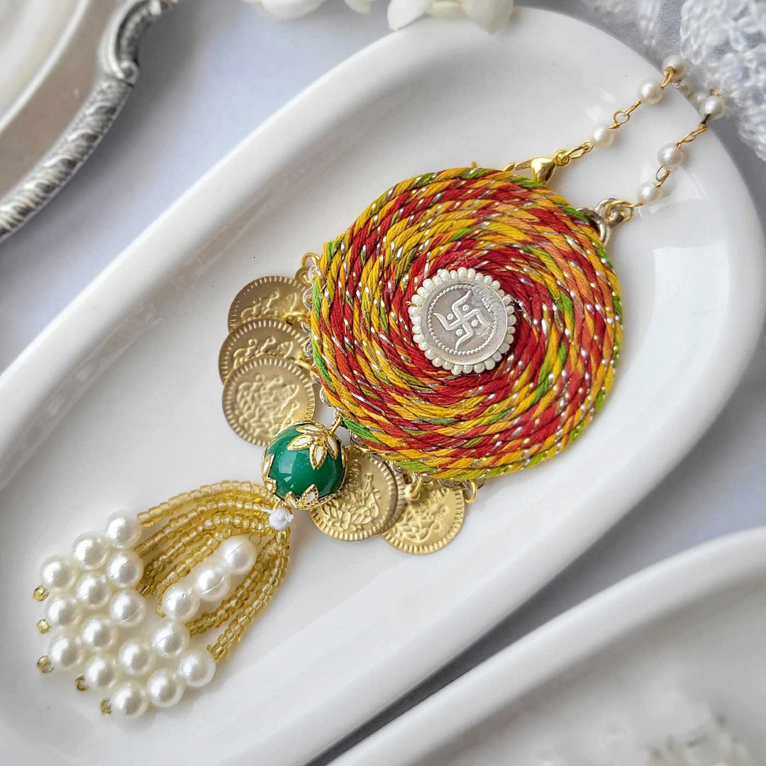 Handmade Beaded Swastik Design Silver Coin Lumba Rakhi for Bhabhi With Roli Chawal