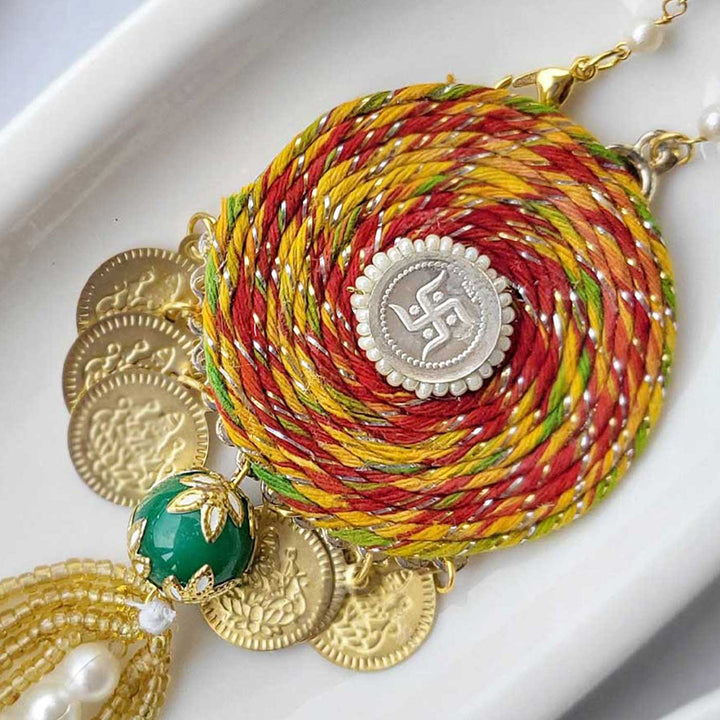 Handmade Beaded Swastik Design Silver Coin Lumba Rakhi for Bhabhi With Roli Chawal