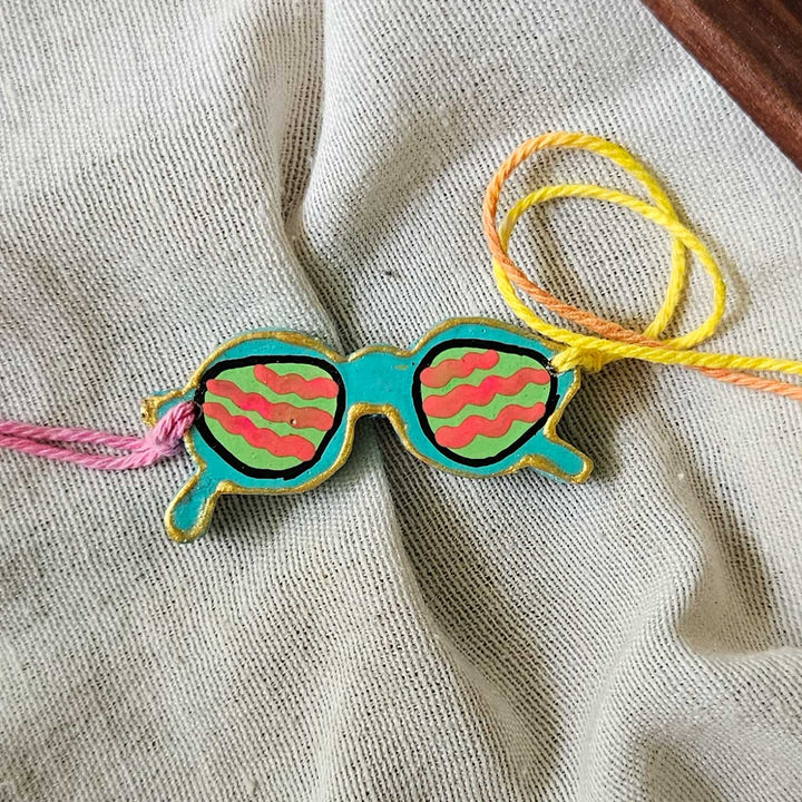 Handpainted Quirky Wooden Rakhi With Roli Chawal 13 - Front View of Second Bracelet