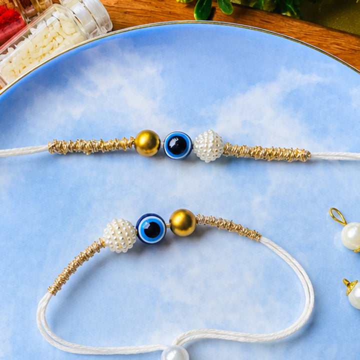 Handmade Bead Evil Eye Charm Kundan & Moti Rakhi With Lumba With Roli Chawal For Bhaiya Bhabhi | Set Of 2