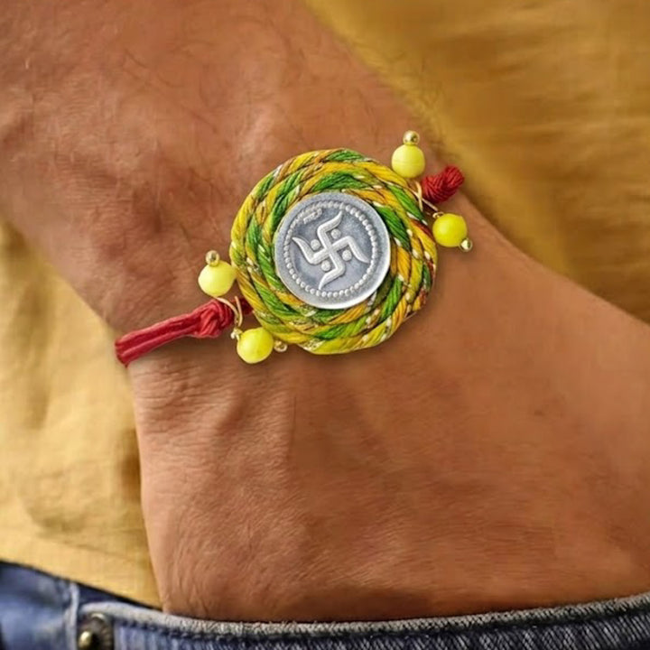 Handmade Swatik Design Silver Rakhi With Roli Chawal For Brother