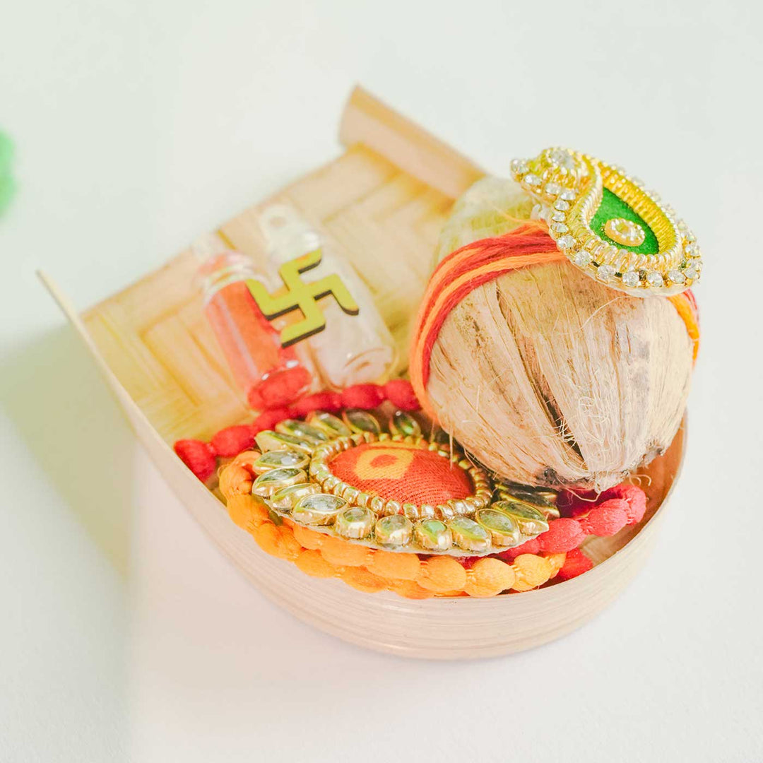 Personalized Handmade Crochet White Lily Rakhi Hamper Includes 1 Crochet Flower 1 Message Card And 1 Rakhi And Roli Chawal - Decorative Items in Basket