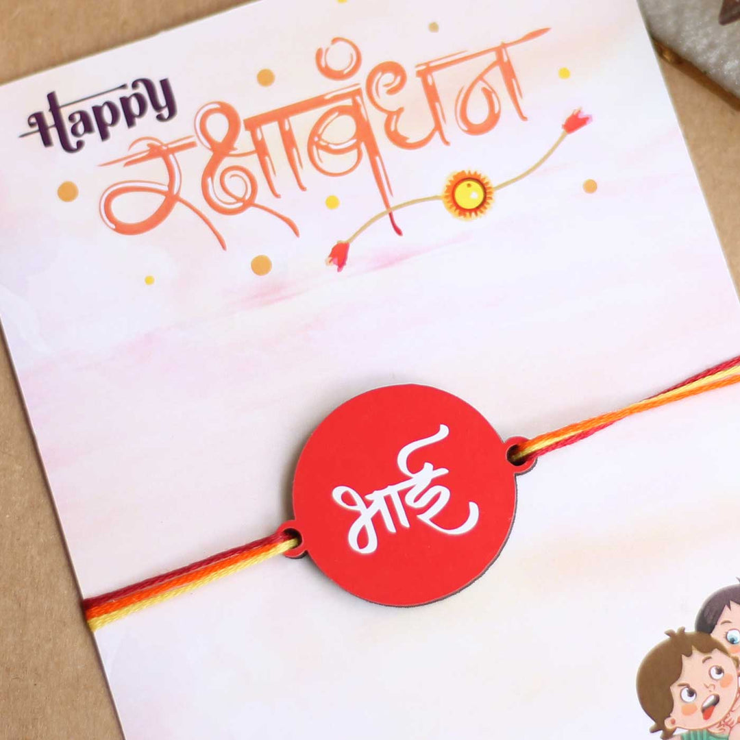 Photo Personalized Minimal Design Metal And Glass Rakhi Hamper For Brother Includes 1 Rakhi And Photo Frame - Close-up of Rakhi on card