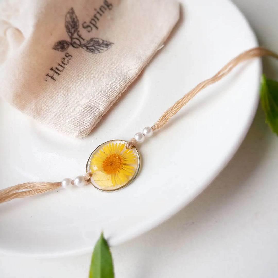 Handmade Preserved Flower Swarn Floral Resin Rakhi With Roli Chawal