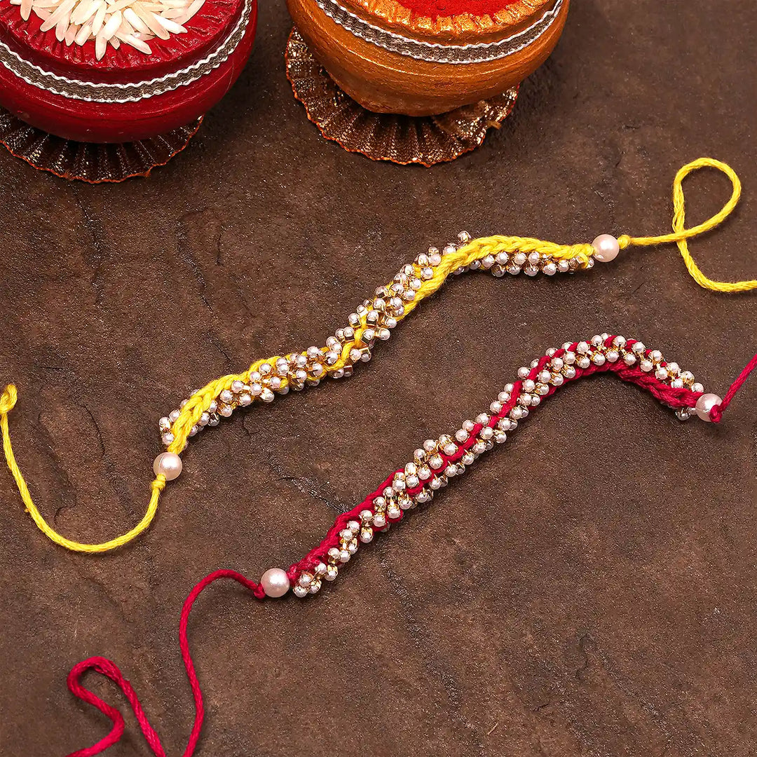 Handmade Crochet Pearl Rakhi With Roli Chawal Set Of 2 - Styled with Decorative Bowls