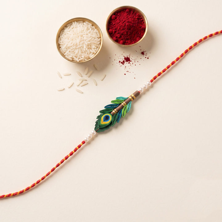 Handmade Paper Quilled Peacock Rakhi With Roli Chawal For Brother