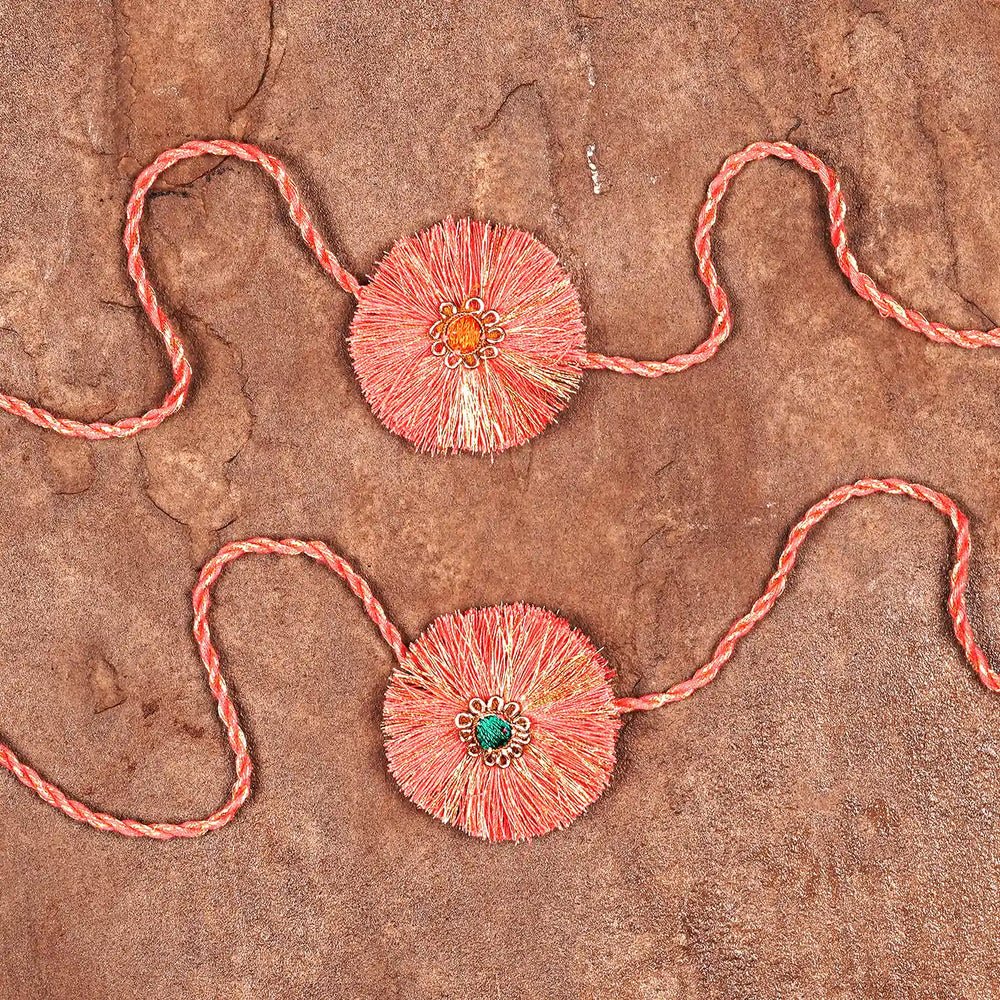 Handmade Round Pink Rakhi With Roli Chawal Set Of 2 - Flat Lay Showing Product Details